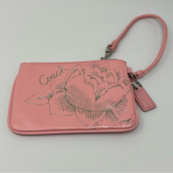 Coach pink wristlet with silver embossed flower - Picture 9 of 13